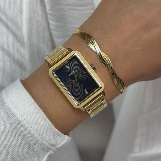 Fluette Watch Steel, Circular Texture Black, Gold Colour CW11512 - moving wristshot.