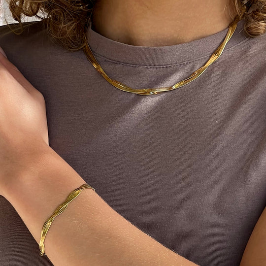 CLUSE Giftbox Élevé Twisted Snake Bracelet & Necklace, Gold Colour CG13301 - combo necklace and bracelet model image