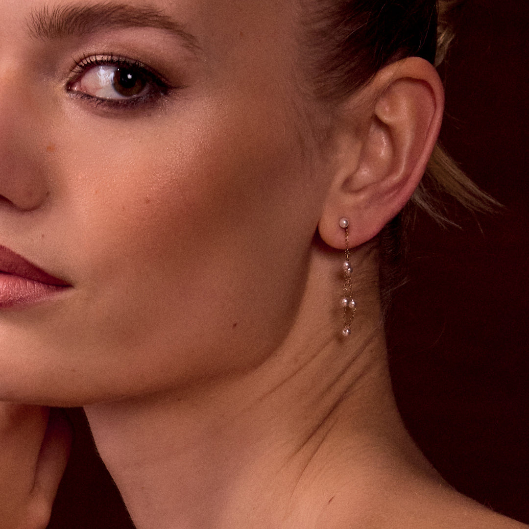 CLUSE Essentielle Pearl Chain Earrings, Gold Colour CE13359 - Earrings on model