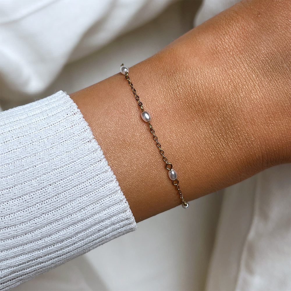 CLUSE Essentielle Pearl Bracelet, Gold Colour CB13377 - Bracelet on wrist