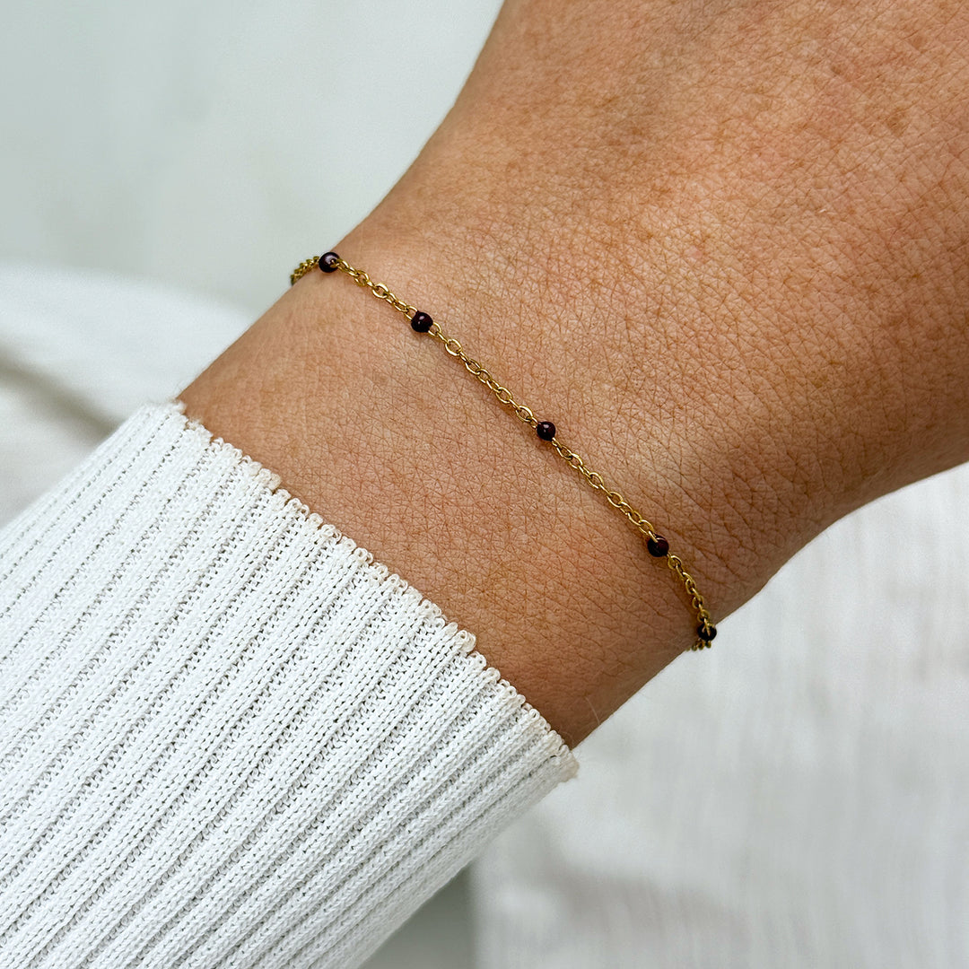 CLUSE Essentielle Burgundy Epoxy Bracelet, Gold Colour CB13387 - Bracelet on wrist
