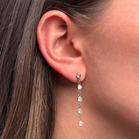 CLUSE Élevé Zirconia Drop Chain Earrings, Gold Colour CE13361 - Earrings on ear