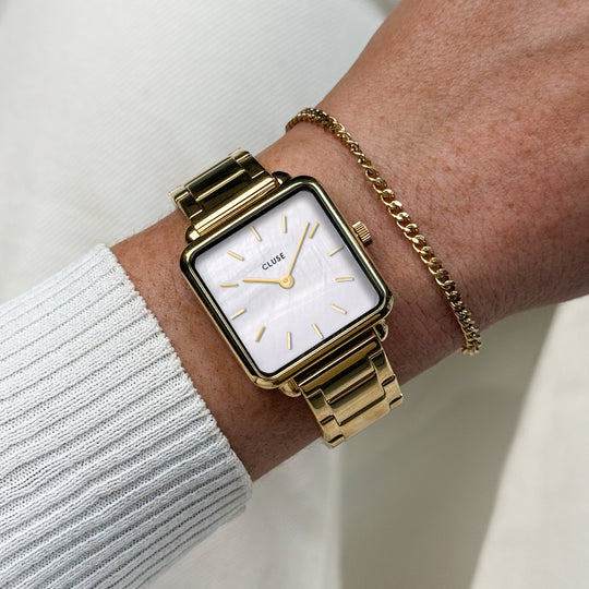 CLUSE Gift Box La Tétragone Watch Steel, White Pearl & Curb Chain Bracelet, Gold Colour CG10327 - watch and bracelet on wrist