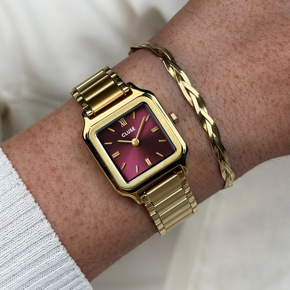 CLUSE Gift Box Gracieuse Petite Watch Steel, Dark Cherry & Braided Snake Bracelet, Gold Colour CG11805 - watch on wrist