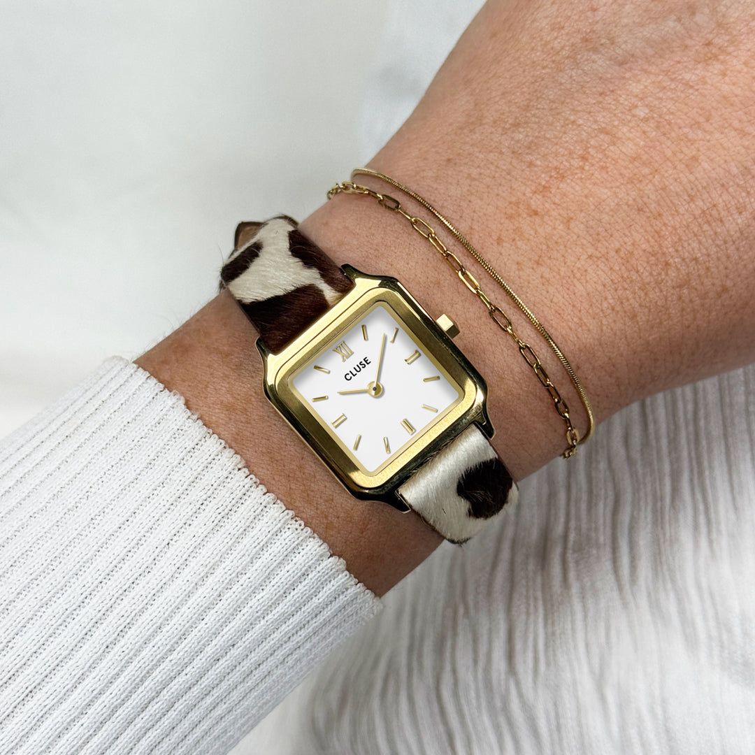 CLUSE Strap 14 mm Cow Print Leather, Gold Colour CS12118 - Strap on wrist