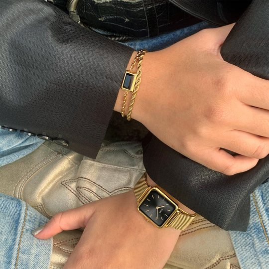 CLUSE La Tetragone Black/Gold Colour CW10308 + Essentielle Rope Bracelet CB13315 +ssentielle Black Rectangular Charm Bracelet CB13339  - Watch on wrist 