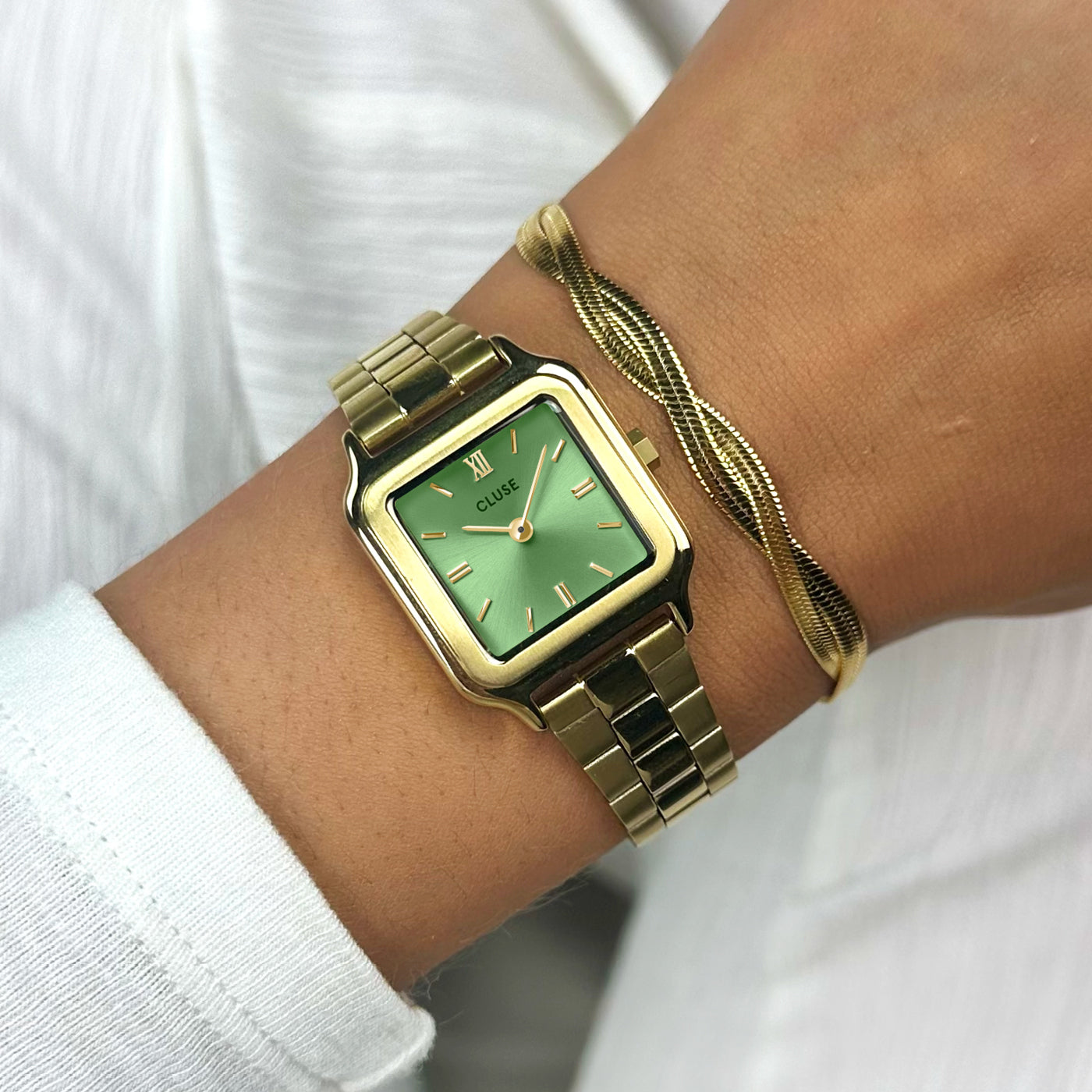 Gold watch hot sale green strap