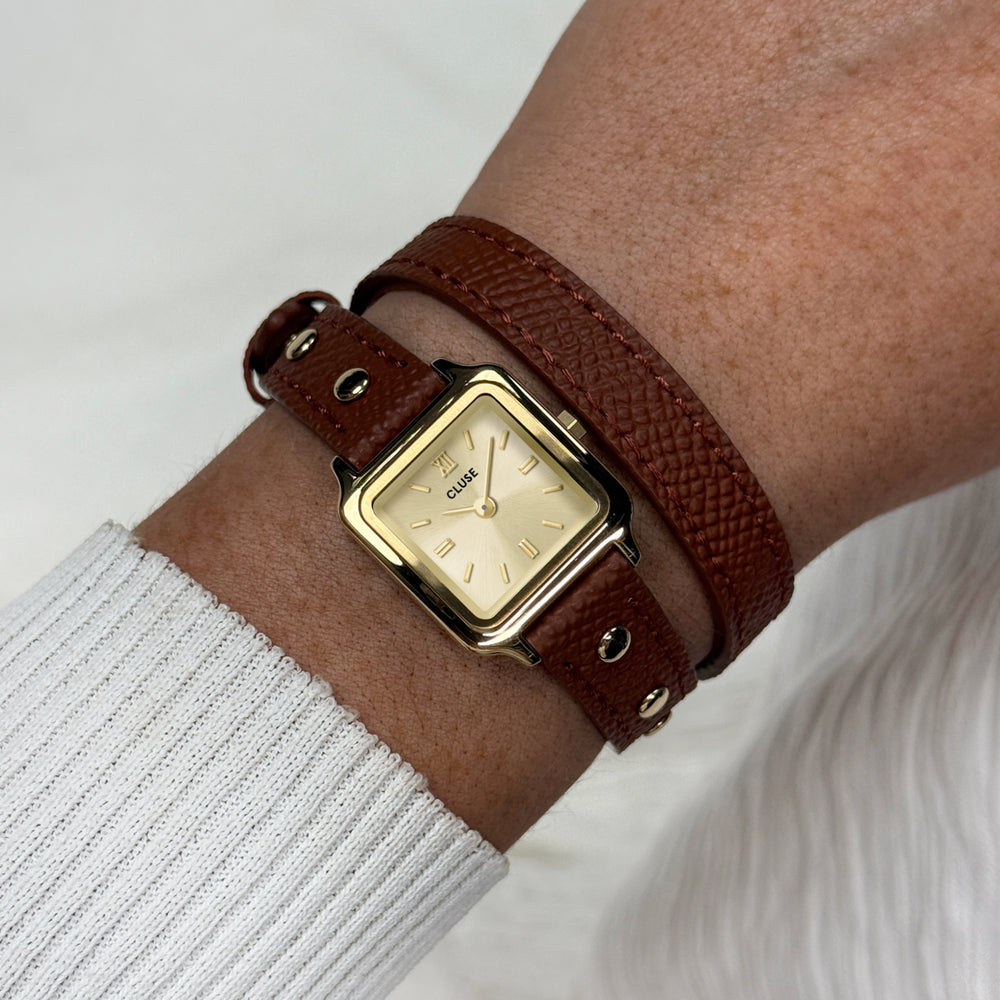 CLUSE Gracieuse Mini Watch Double Leather Nutshell, Studs, Gold Colour CW15507 - Watch on wrist