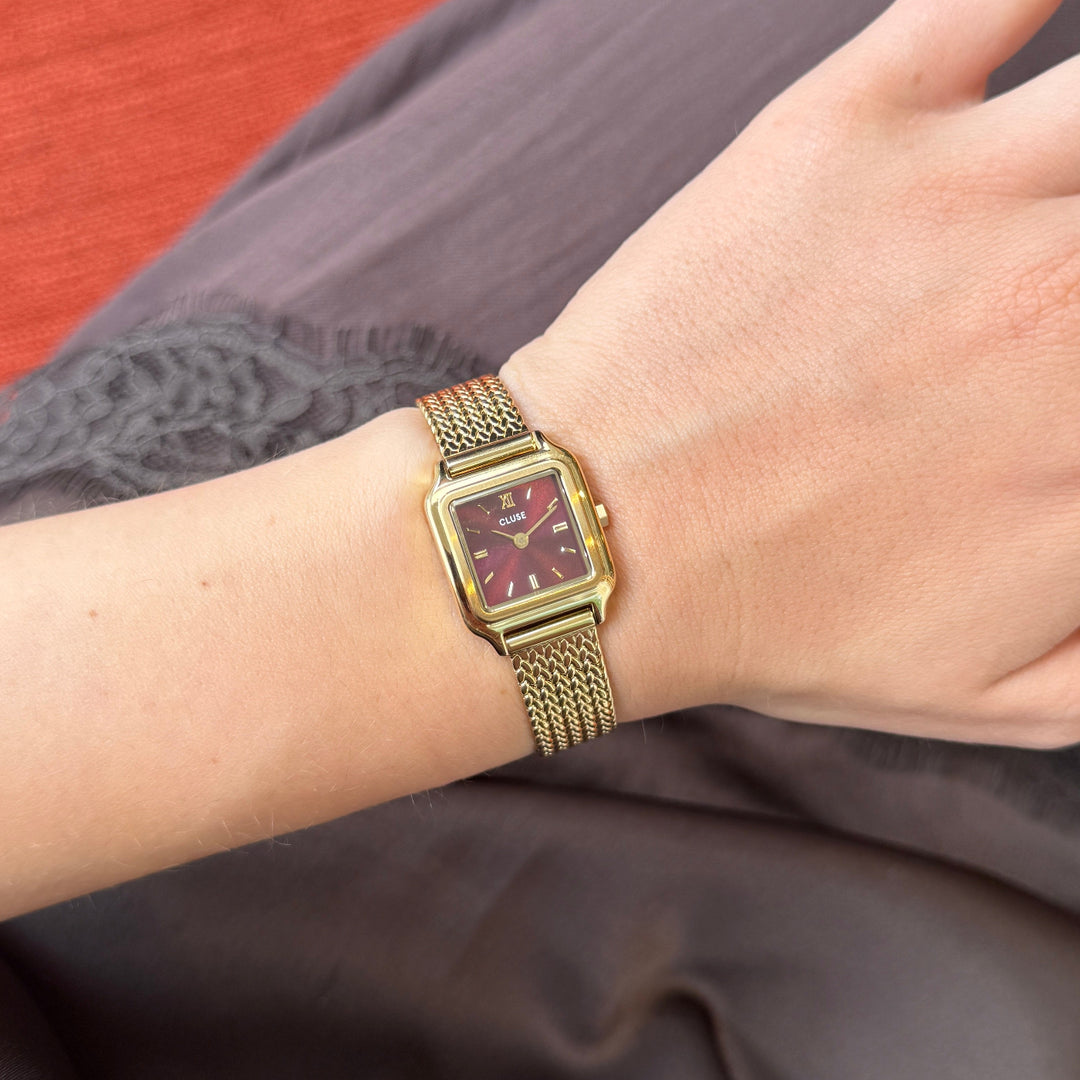 CLUSE Gracieuse Mini Watch Mesh, Dark Cherry, Gold Colour CW15510 - Watch on model