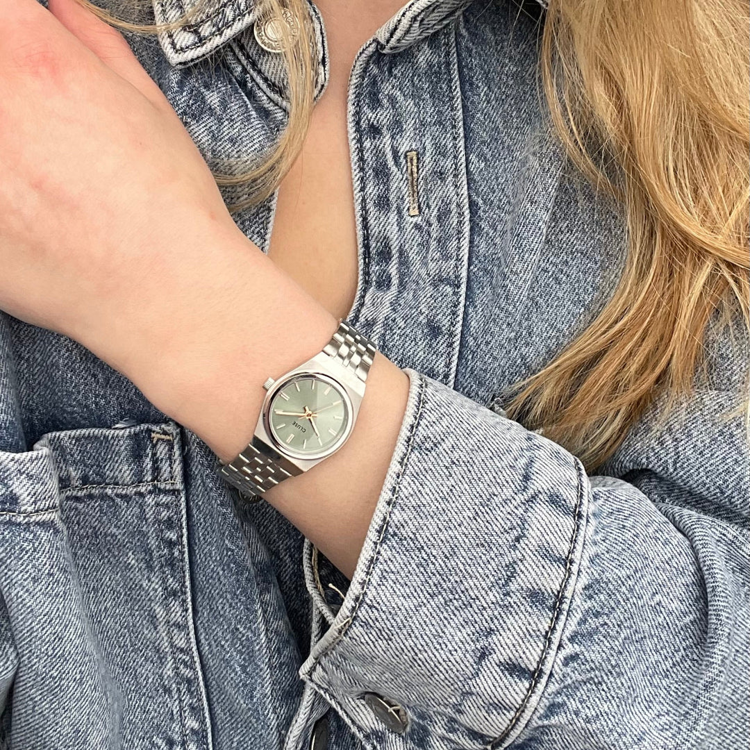 CLUSE Retro 70s Mini Watch Steel, Sage Green, Silver Colour CW16301 - Watch on model