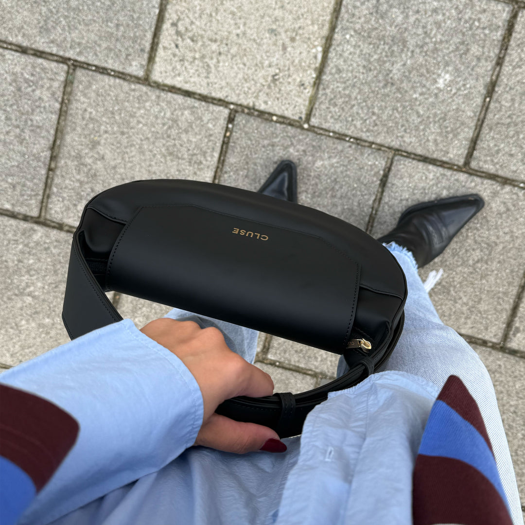 CLUSE Sacroisé Crossbody Bag, Black, Gold Colour CX04901 - Bag worn by model