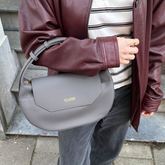 CLUSE Sacroisé Crossbody Bag, Dark Grey, Gold Colour CX04903 - model wearing bag