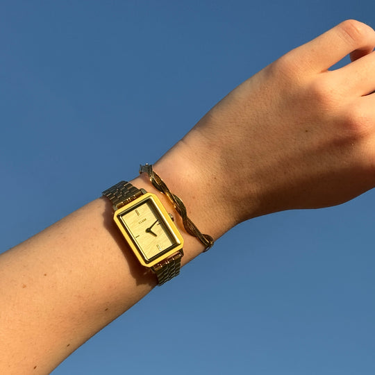 CLUSE Gift Box Fluette Watch Steel, Sand Texture &amp; Twisted Snake Bracelet, Gold Colour - CG11509 - Watch and bracelet on model