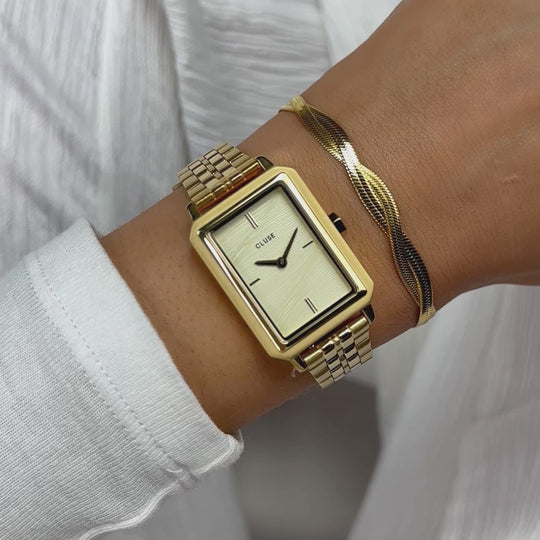 Fluette Watch Steel, Sand Texture Gold, Gold Colour CW11511 - moving wristshot.