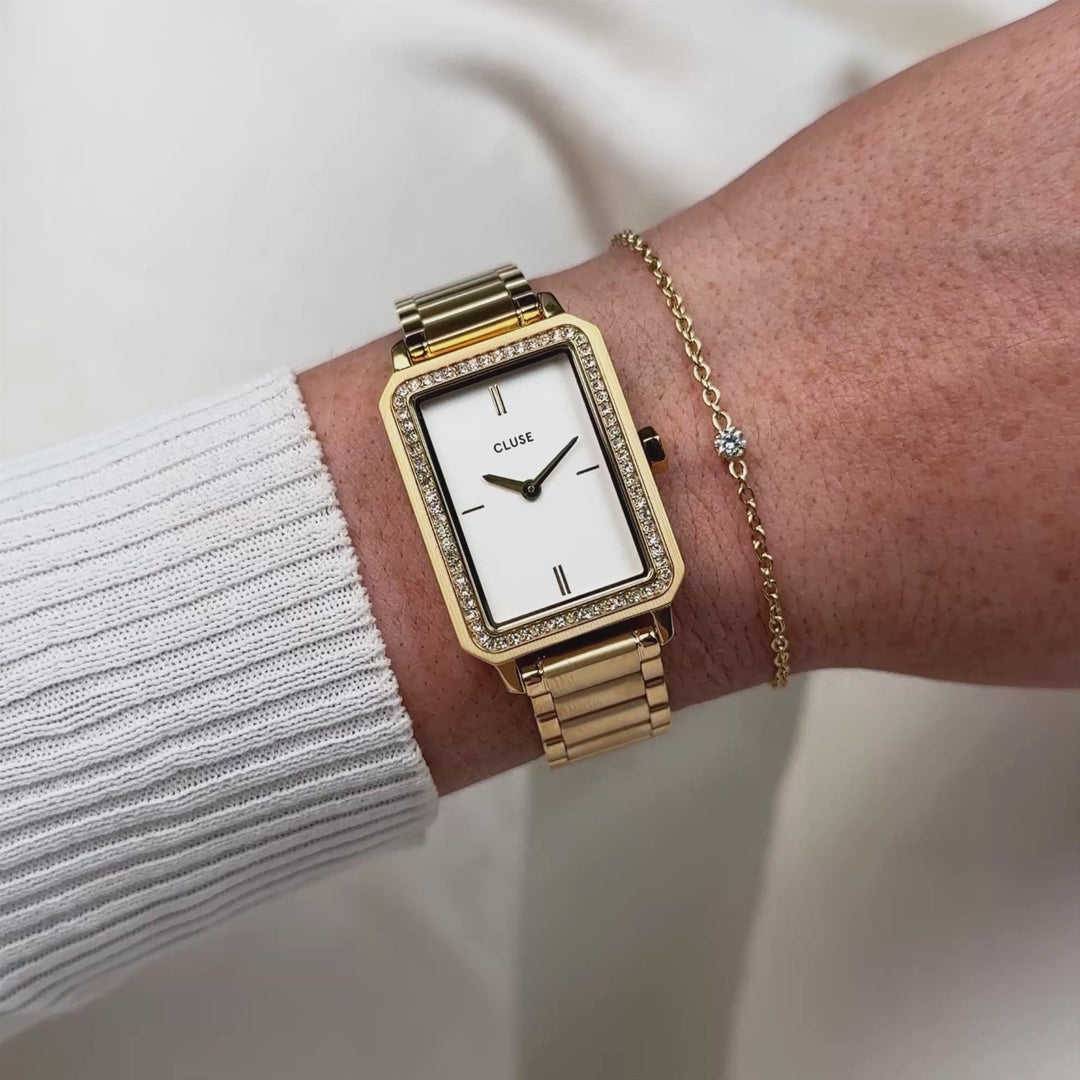 CLUSE Gift Box Fluette Watch Steel White Stones & Zircon Bracelet, Gold Colour CG11508 - moving wrist shot with watch and bracelet