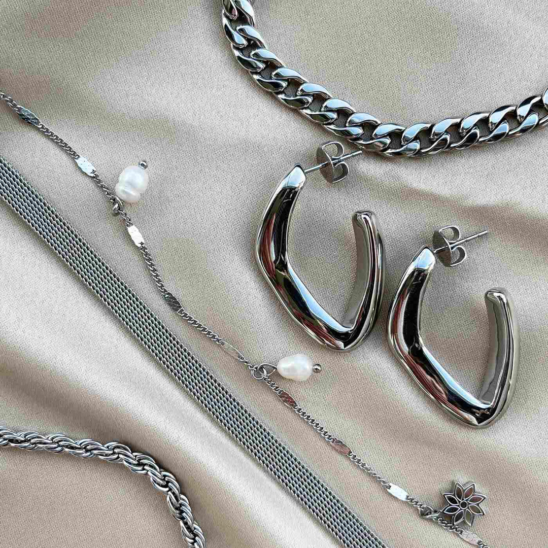 CLUSE Essentielle Big Twisted Hoops Earrings Silver Colour CE13315 - Earrings