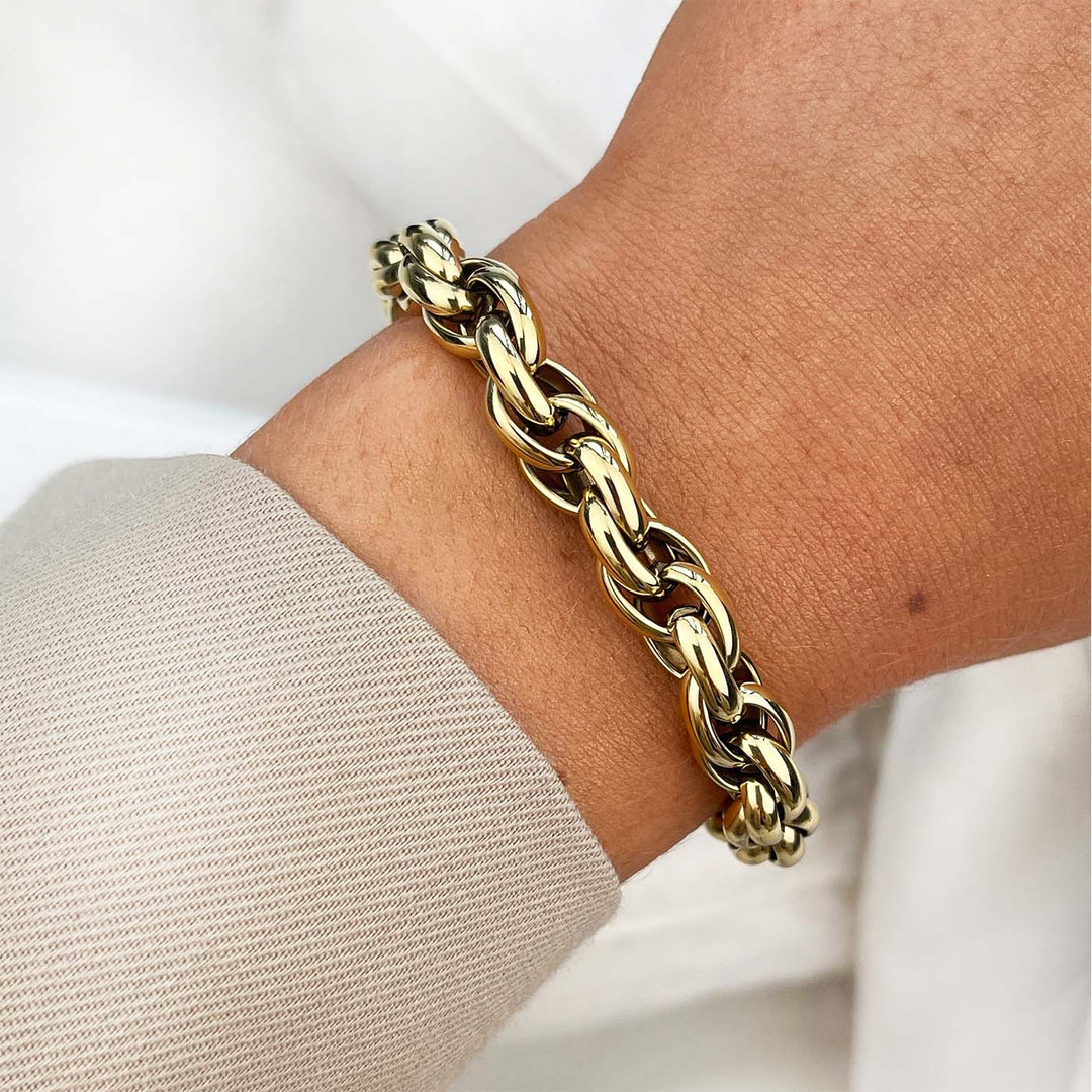 CLUSE Essentielle Chunky Twisted Chain Bracelet, Gold Colour CB13341 - Bracelet on wrist