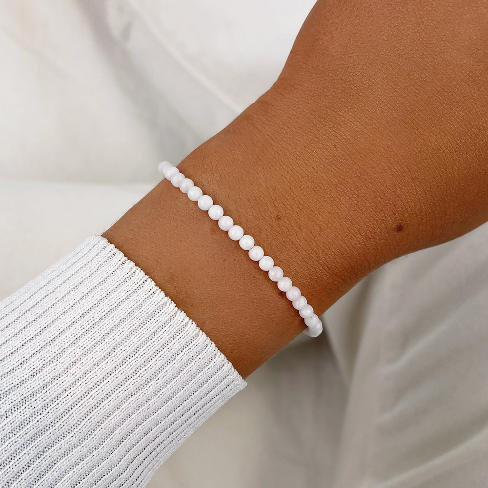 Essentielle White Beads Bracelet, Rose Gold Colour CB13357 - Bracelet on wrist