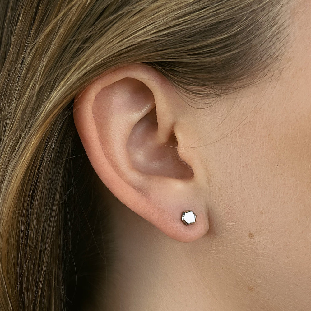 CLUSE Essentielle Hexagon Stud Earring, Silver Colour CE13325 - Earrings on the ear
