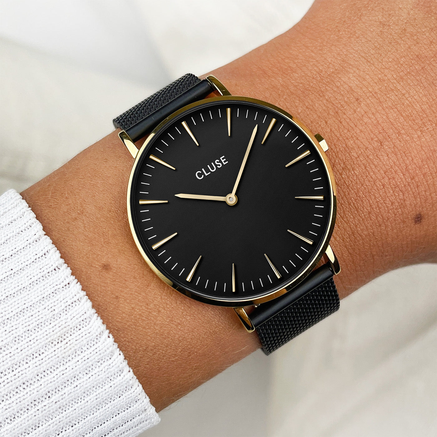 Black strap gold online watch